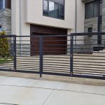 Bi-fold aluminum driveway gate