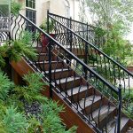 Exterior decorative iron stair and deck railing Exterior decorative wrought iron stair and deck railing