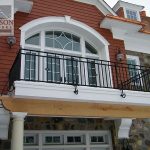 Walk-out to a balcony railing walk-out exterior balcony railing