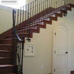 Interior wrought iron stair railing Interior stair railing on a corner