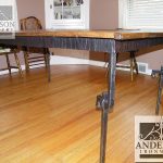 Wrought iron table frame with wooden top Wrought iron table frame with wooden top