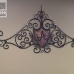 Decorative wrought iron wall art of family crest Decorative wrought iron wall art of family crest