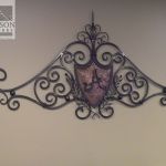 Decorative wrought iron wall art of family crest Decorative wrought iron wall art of family crest