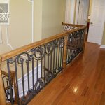 Interior rail with wood handrail Interior wrought iron railing with wood handrail