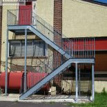 Steel second-story stair platforms, railings, and stair rails Steel second-story stair platforms, railings, and stair rails