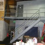 Commercial steel second-story stair platforms, railings, and stair rails Commercial steel second-story stair platforms, railings, and stair rails