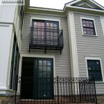 Town home with exterior balcony Town home with exterior wrought iron balcony