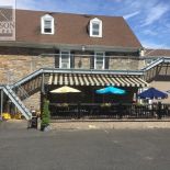 Commercial steel second-story stair platforms, railings, and stair rails Commercial steel second-story stair platforms, railings, and stair rails