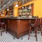 Wrought iron bar foot rail and bartop edges Wrought iron bar foot rail and bartop edges