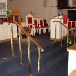 Polished brass stair railing Polished brass stair railing