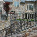 Grand exterior curved stair railing Grand exterior curved stair railing