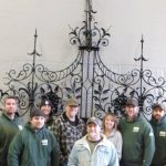 Employee group photo in front of completed Princeton University 1911 front gate restoration. Employee group photo in front of completed Princeton University 1911 front gate restoration.