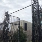 Ferris Thompson Gateway missing decorative portions once adorning the top. Ferris Thompson Gateway missing decorative portions once adorning the top.